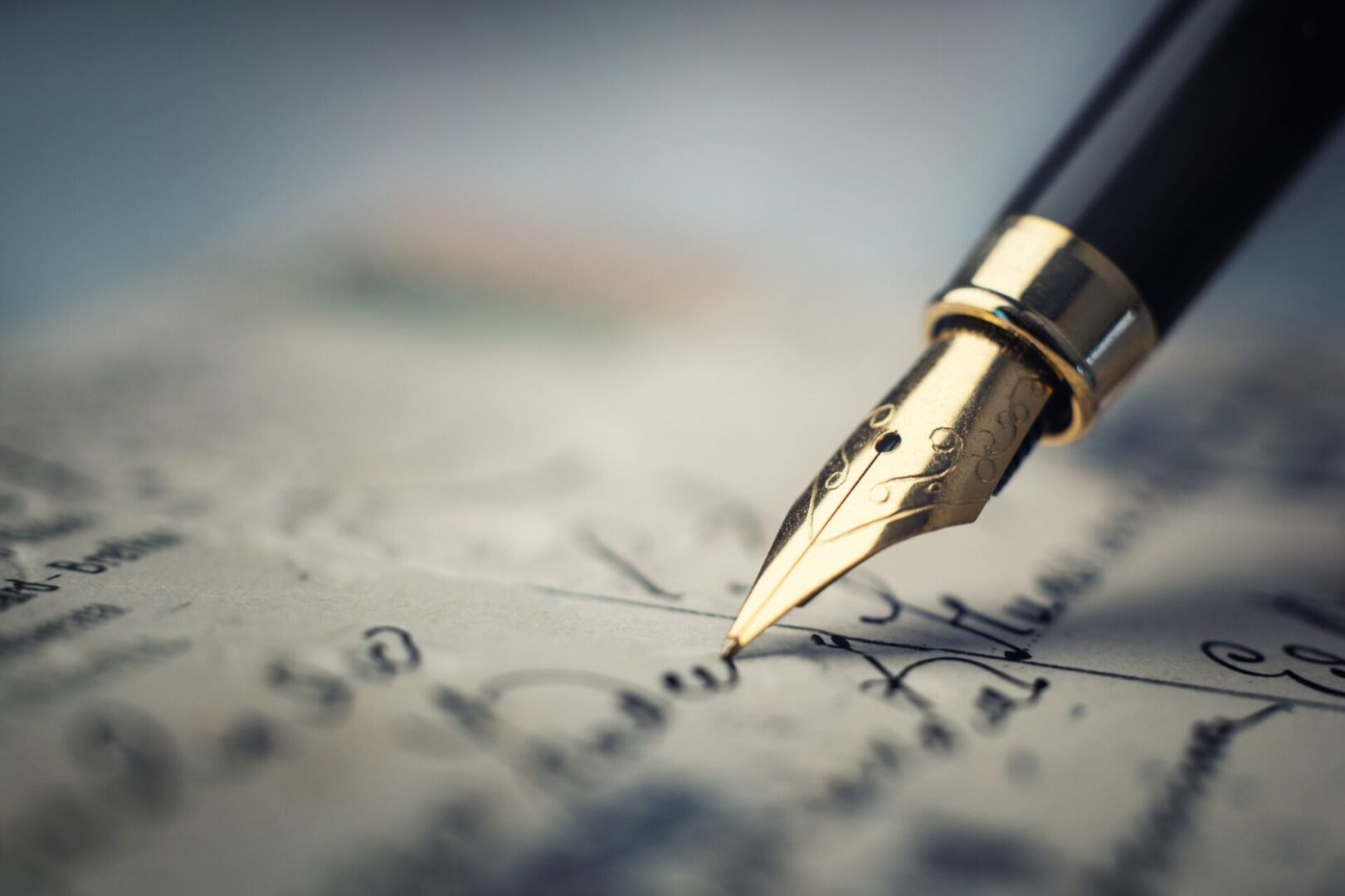 Fountain pen writing on a handwritten letter.