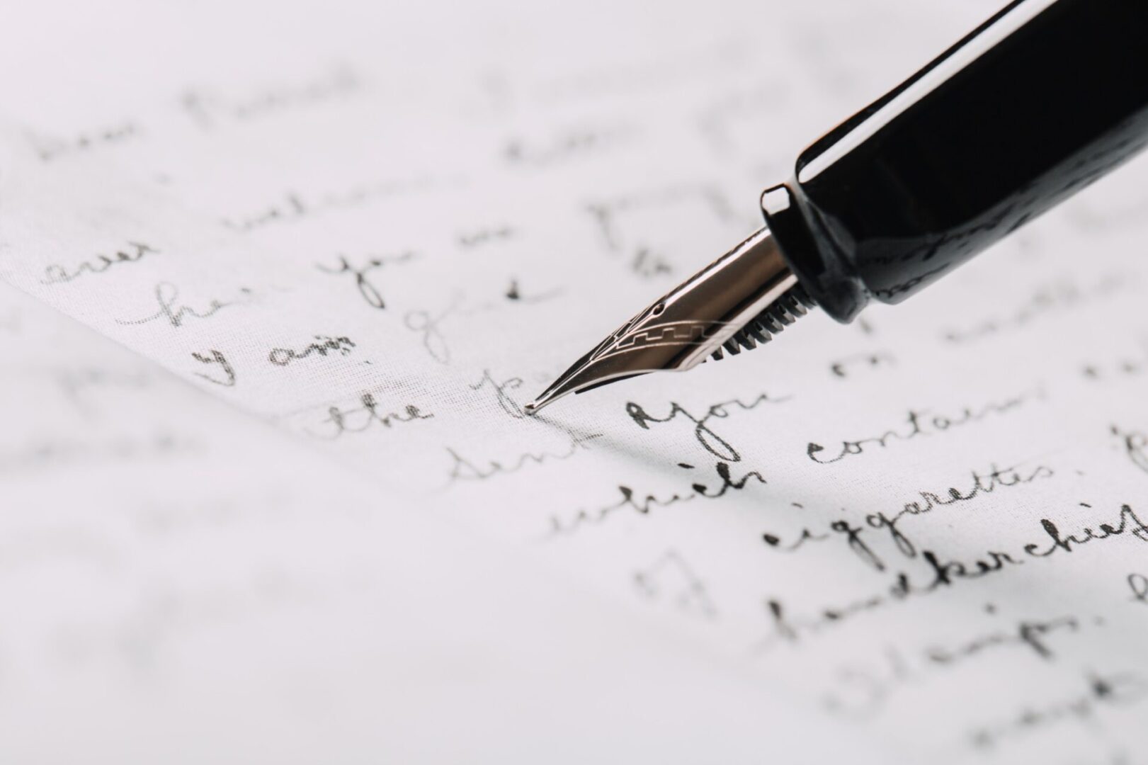 Fountain pen writing on a handwritten letter.